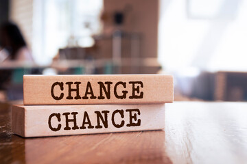 Wooden blocks with words 'change and chance'.