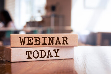 Wooden blocks with words 'webinar today reminder'. Education concept