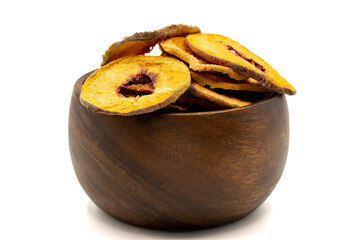 Dried peach slices. Sliced dry peach isolated on white background. Sun-dried fruit. Close up