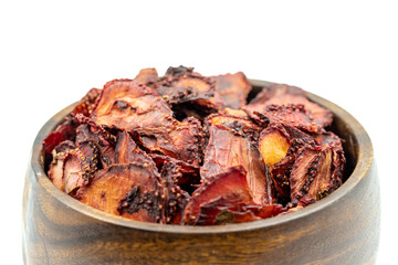 Dried strawberry slices. Sliced dried strawberries isolated on a white background. Sun-dried fruit. close up