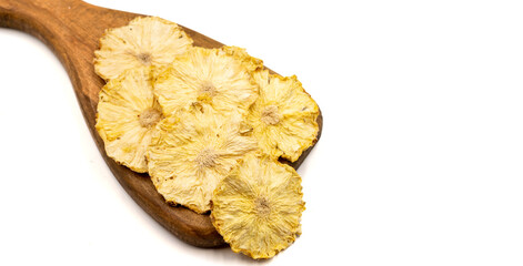 Naklejka premium Dried pineapple slices. Sliced dry pineapple isolated on white background. Sun-dried fruit. close up. Copy space