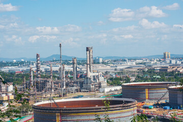 Oil refinery gas petrol plant industry with crude tank, gasoline supply and chemical factory. Petroleum barrel fuel heavy industry oil refinery manufacturing factory plant. Refinery industry concept