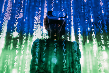Digital code falling on woman wearing virtual reality simulator in front of wall