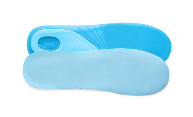 Light blue orthopedic insoles isolated on white, top view