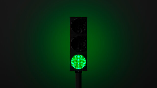 glowing green traffic light with green backlight on a dark wall. Symbol of movement or go. 3d render