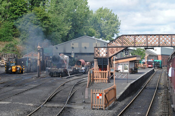 View of Old Railway Station with Smoke from OLd Steam Locomotive 