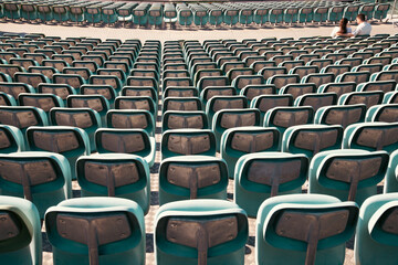 Empty Plastic Chairs at the Stadium