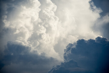 Beautiful blue sky with clouds. Anime sky clouds, anime style. Dramatic white clouds and sunlight. Anime sunrise pastel background. Sky background for animation or designer.
