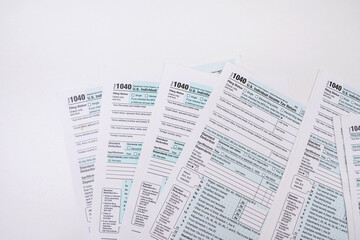 empty 1040 individual tax form ready to fill in office desk