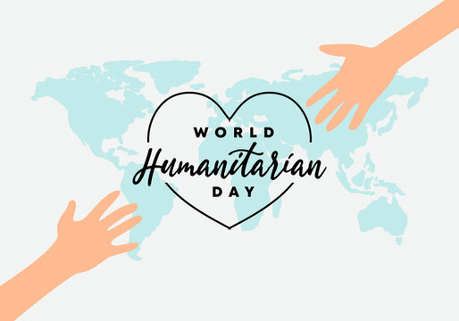 World humanitarian day background with handwritten text and hand on world map isolated on grey white background.