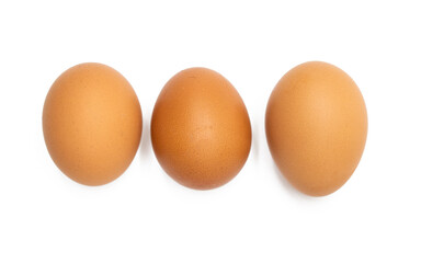 Three chicken eggs isolated on white a background.