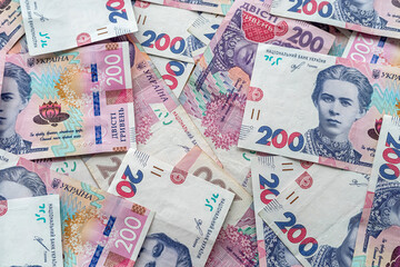 a large amount of bribes in Ukrainian currency is on the table after their withdrawal.