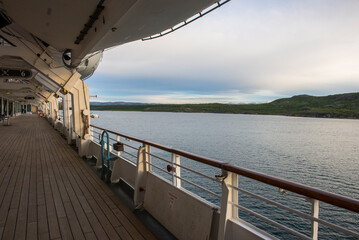 View of the Midnight Sun in the Barents Sea, from the deck of a ship