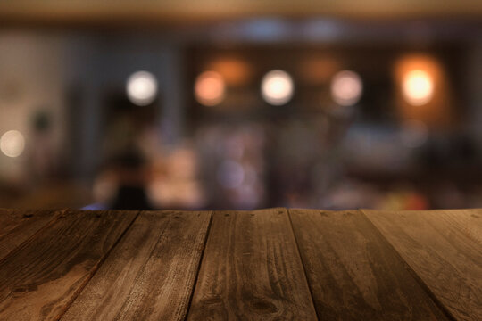 Top wood tableBlur minimal cafe shop midcentury style background. cafe in store Blur Background or design key visual layout