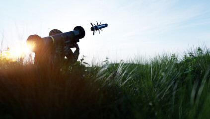 Obraz na płótnie Canvas Soldier firing anti-tank missile at war