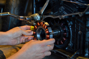 Motorcycle repair in the garage