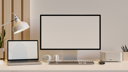 Modern office desk workspace with PC computer and notebook laptop mockup over white wall.