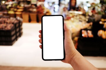 Women's hands holding cell telephone blank copy space screen. smart phone with technology concept.