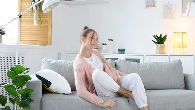 woman go to bed on the sofa in the living room at lunchtime