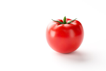Red ripe tomato isolated on white with copy space 