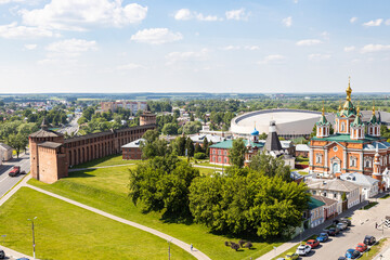 above view of wall and Tower of Kolomna Kremlin and Lazhechnikova Street with Uspenskiy Brusenskiy Monastery in Old Kolomna city on summer day from bell tower Church of St John the Evangelist