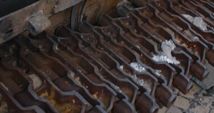 Close-up detailed tracking shot -  caterpillar  track of a burnt-out Russian tank. Exibition in Kyiv on Sophia Square Rushy Military vehicle destroyed by the explosion of Ukrainian artillery shelling