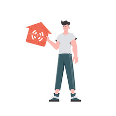 The man is depicted in full growth, holding the icon of the house in his hands. IoT concept. Vector illustration in trendy flat style.