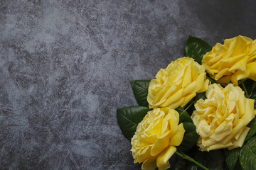 Yellow roses on wooden background, Christmas concept . Top view flat lay isolated background with copy space for christmas wallpaper.