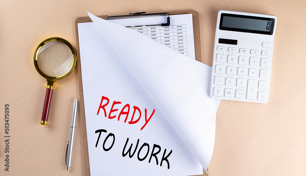 Poster clipboard with chart and text ready to work with magnifier ,calculator on beige background