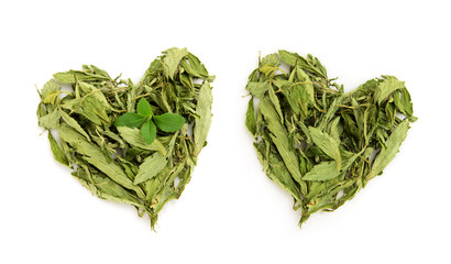 Dried stevia leaves arranged in a heart shape.top view. - obrazy, fototapety, plakaty