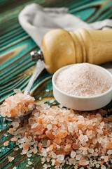 pink Himalayan salt on a wooden rustic background