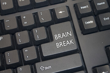 Black Computer Keyboard with Brain Break text. Close-up of an electronic Computer Device part,...