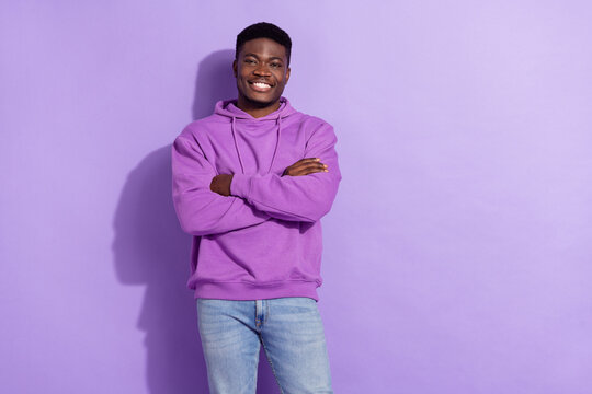 Portrait of attractive cheerful content guy folded arms wearing spring look isolated over bright violet lilac color background