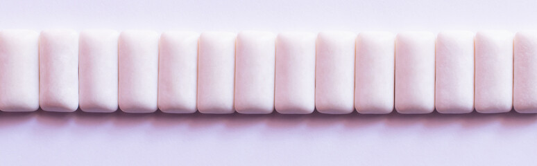 Flat lay of chewing gums on white background, banner.