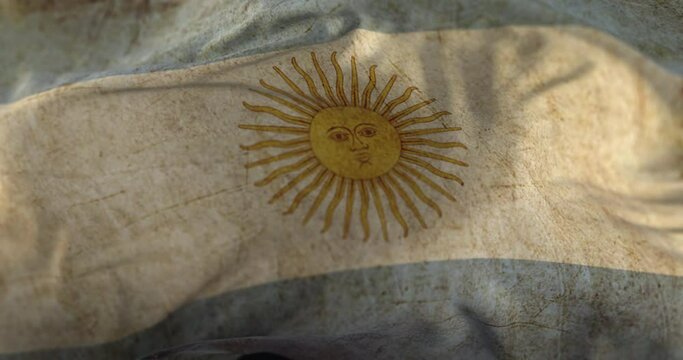 Old Argentina Flag waving at wind. Loop