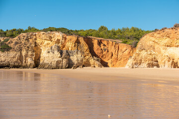 Fototapeta na wymiar View of the Alemao Beach (Praia do Alemao) in Portimao Algarve Portugal; Concept for travel in Portugal and Algarve.
