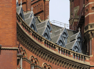 Neo Gothic building with slate roof and dormers.
London. United Kingdom.