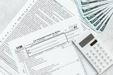 Naklejka na ściany i meble Annual tax form under US law with culculator. Tax payment concept