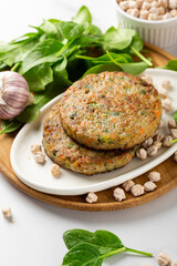 Fritters are made from spinach and chickpeas food close up