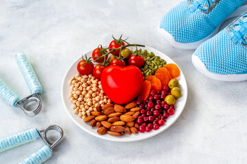 Cholesterol diet concept with Less fat food in plate with heart object