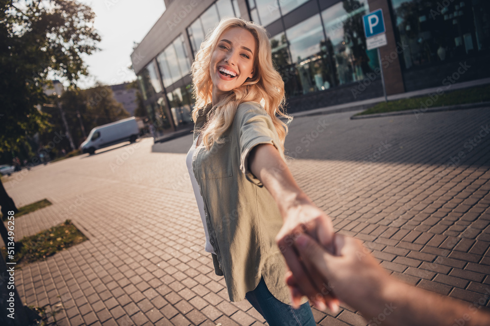 Sticker First person point view portrait of attractive blond cheerful girl good mood strolling having fun in town outdoors