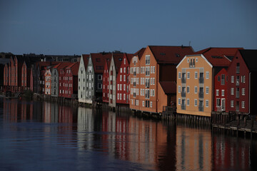 Obraz premium Scenic View Of Lake By Buildings Against Sky, Trondheim, Norway
