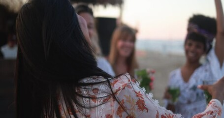 Multiracial friends having fun dancing together outdoor at beach party