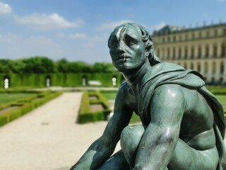 Statue in the Garden Castle of Versailles