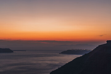 Amazing sunset from Fira (Thera) in Santorini and amazing calderas.