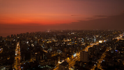 Fototapeta premium Excellent night aerial view of Av. Alfredo Benavides and Vía Expresa Luis Bedoya Reyes in the city of Lima.