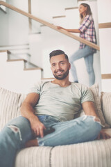Fototapeta premium close up. young man sitting on sofa.