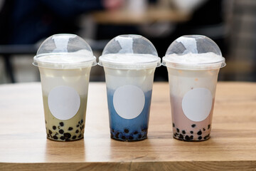 Butterfly pea milk bubble tea with tapioca pearls. Place for a logo