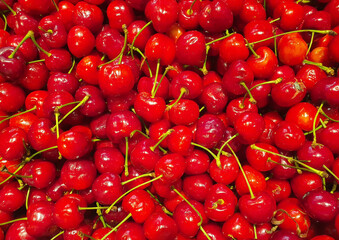 a close-up with red cherry background