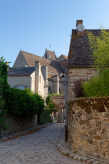 Fototapeta na wymiar Street in Saint-Sulpice-de-Favières village. Ile-de-France region